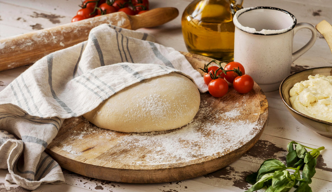 Comment réussir une pâte à pizza maison